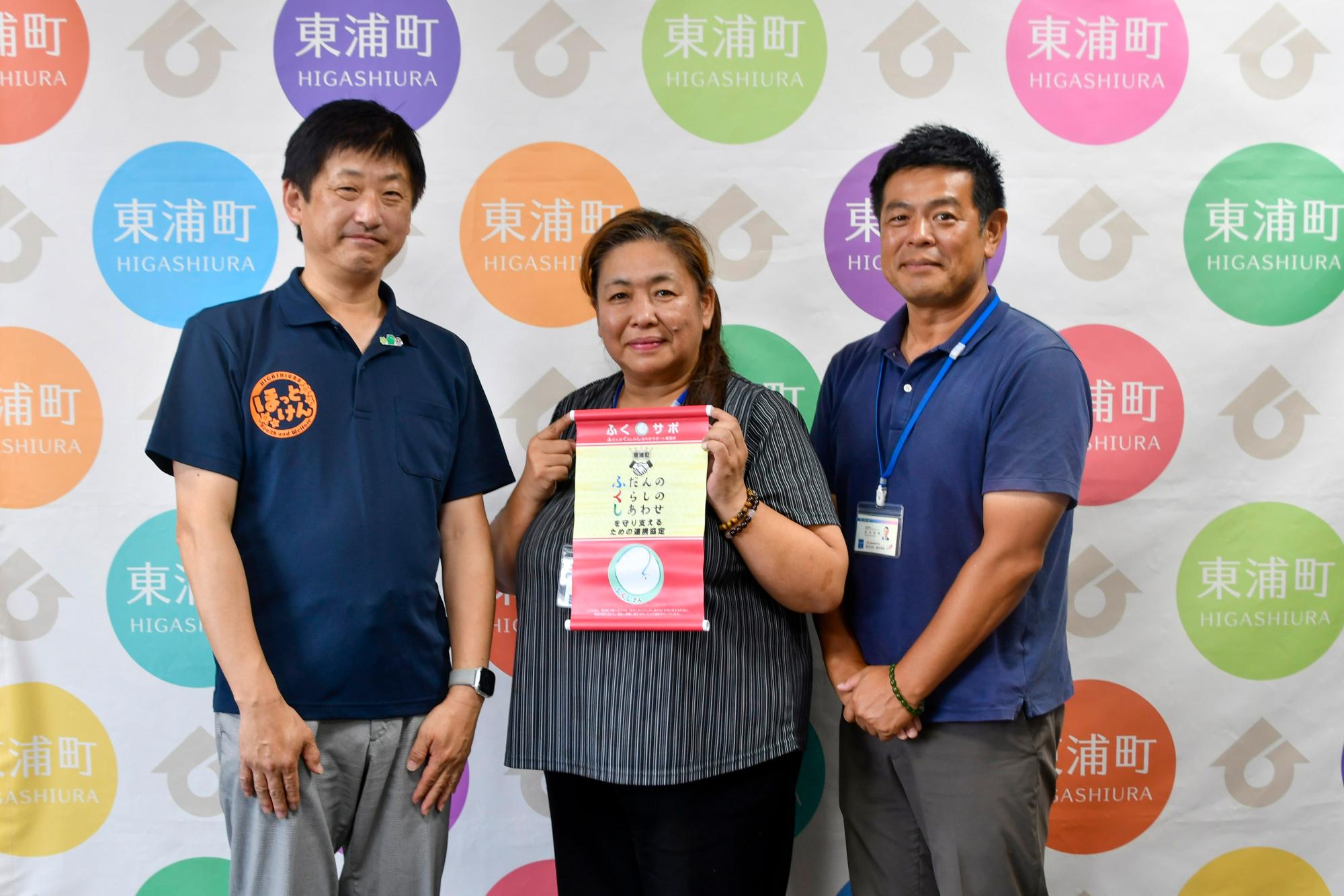来訪者との記念撮影
